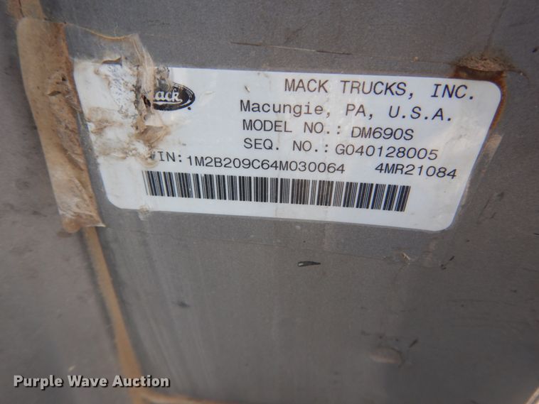 image for item IY9722 2004 Mack DM690S  roll-off container truck