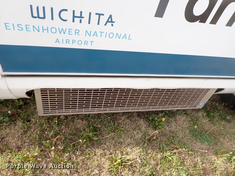 image for item DJ5618 2014 Ford E450 Super Duty  shuttle bus