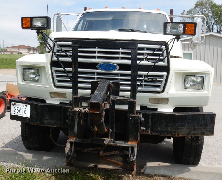 image for item DI6619 1992 Ford F700  dump flatbed truck