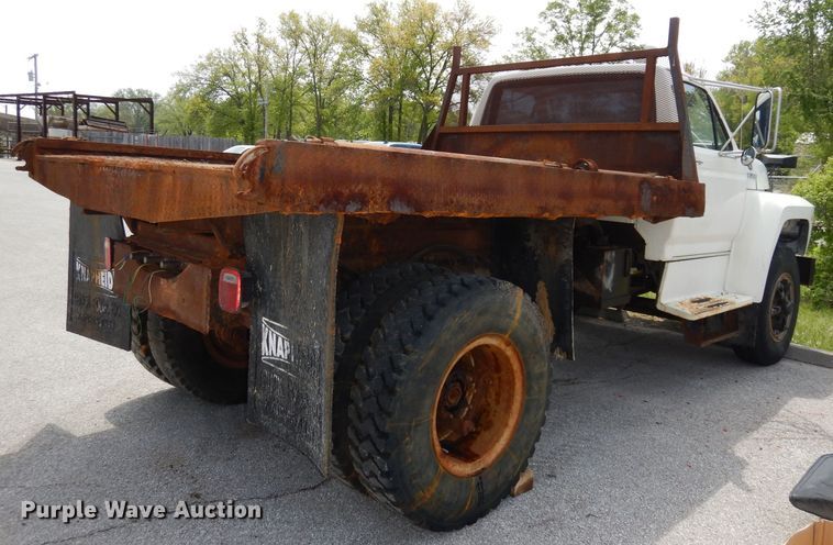 image for item DI6619 1992 Ford F700  dump flatbed truck