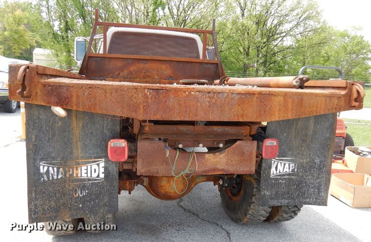 image for item DI6619 1992 Ford F700  dump flatbed truck