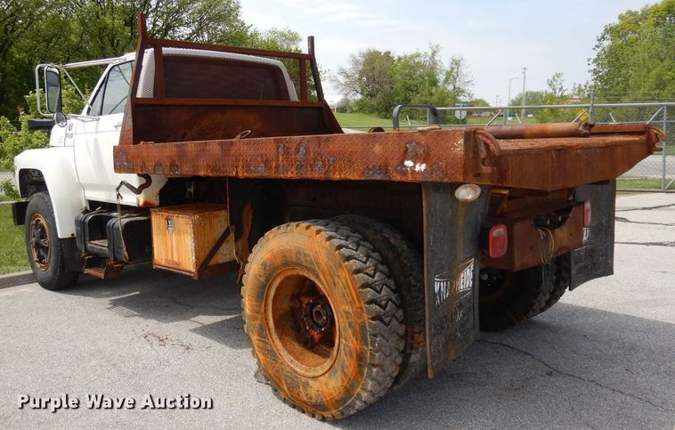 image for item DI6619 1992 Ford F700  dump flatbed truck