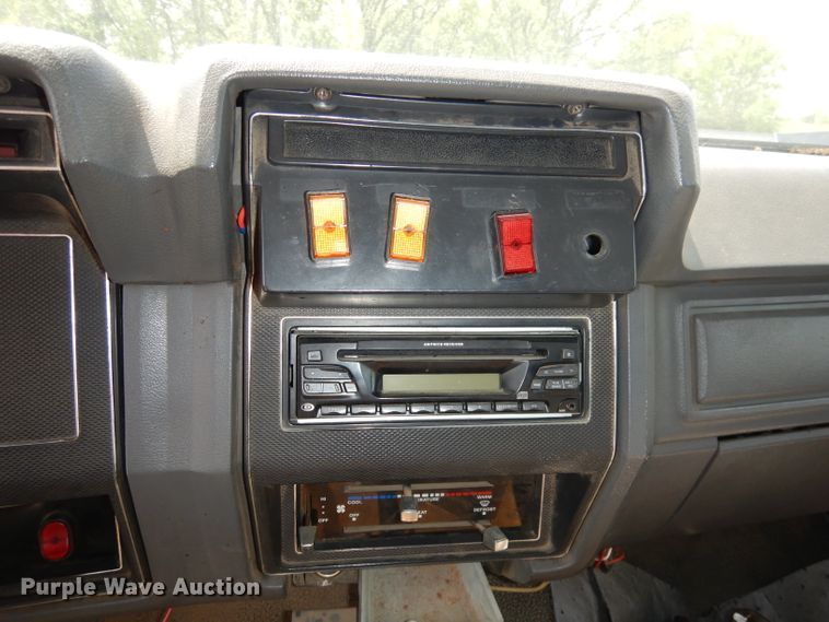 image for item DI6619 1992 Ford F700  dump flatbed truck