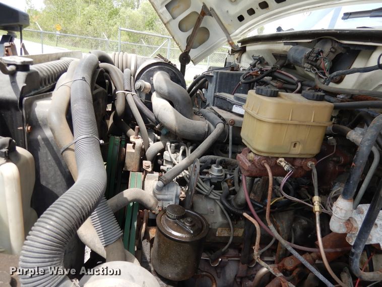 image for item DI6619 1992 Ford F700  dump flatbed truck