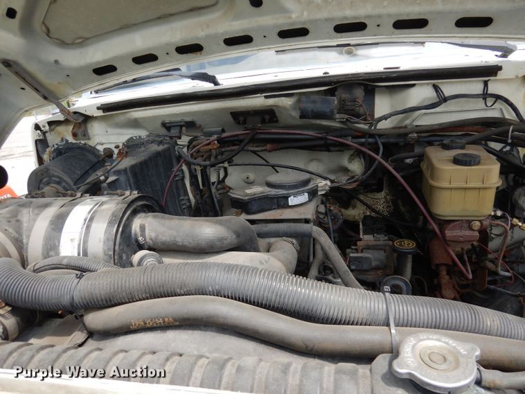 image for item DI6619 1992 Ford F700  dump flatbed truck