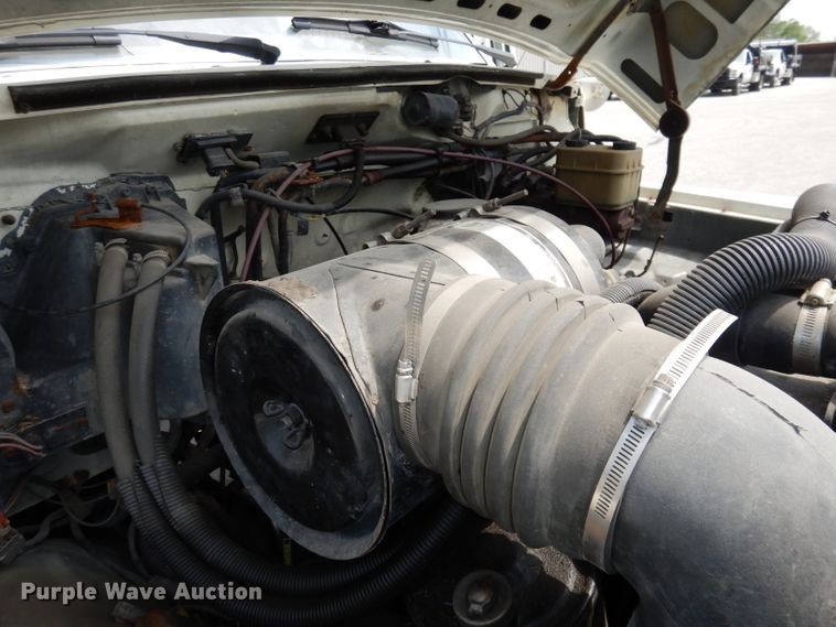 image for item DI6619 1992 Ford F700  dump flatbed truck