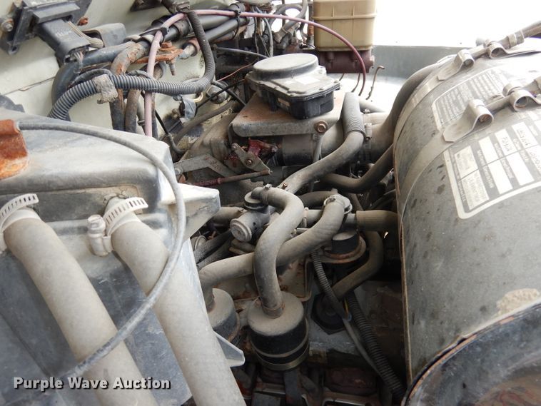 image for item DI6619 1992 Ford F700  dump flatbed truck