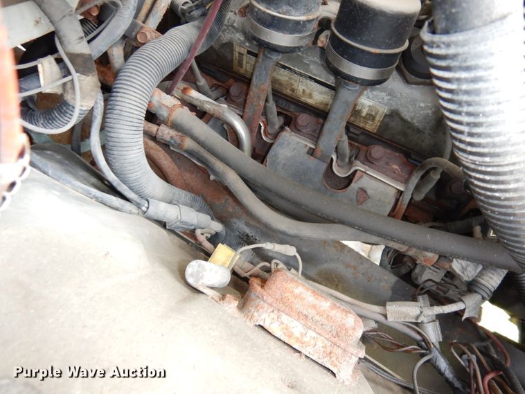 image for item DI6619 1992 Ford F700  dump flatbed truck