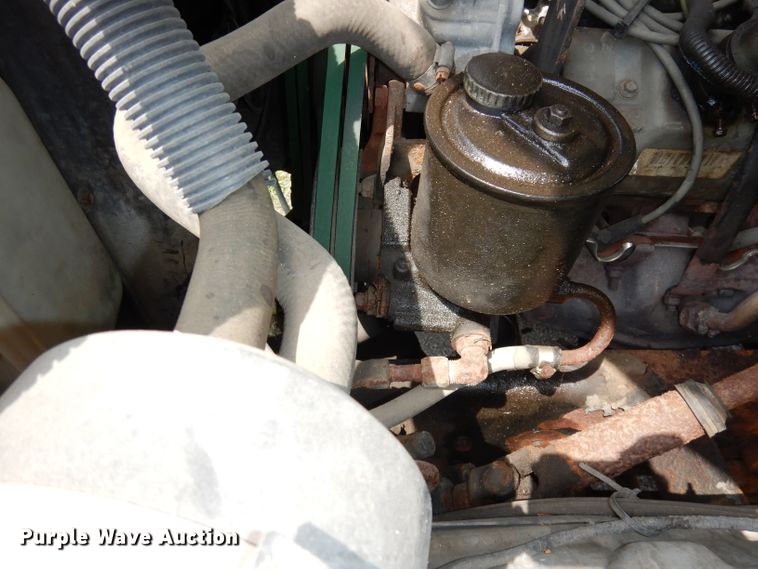 image for item DI6619 1992 Ford F700  dump flatbed truck