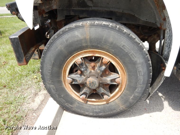 image for item DI6619 1992 Ford F700  dump flatbed truck