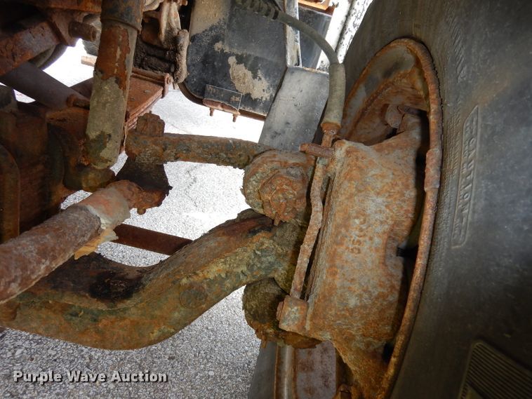 image for item DI6619 1992 Ford F700  dump flatbed truck