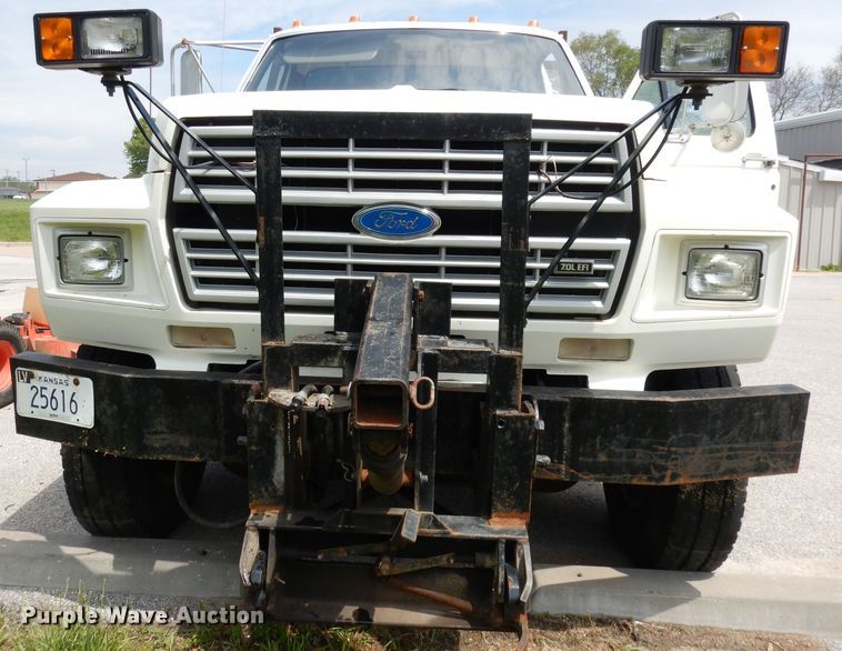 image for item DI6619 1992 Ford F700  dump flatbed truck