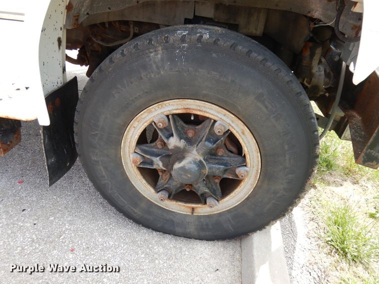 image for item DI6619 1992 Ford F700  dump flatbed truck