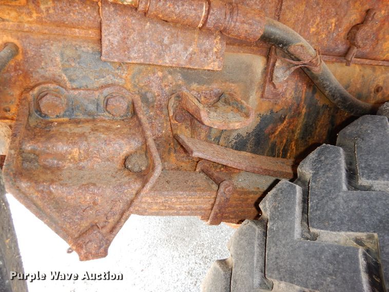 image for item DI6619 1992 Ford F700  dump flatbed truck