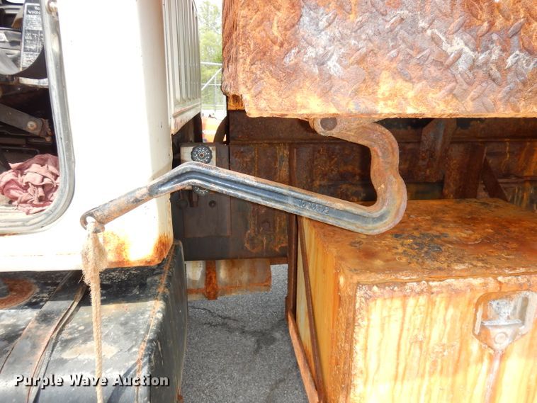 image for item DI6619 1992 Ford F700  dump flatbed truck