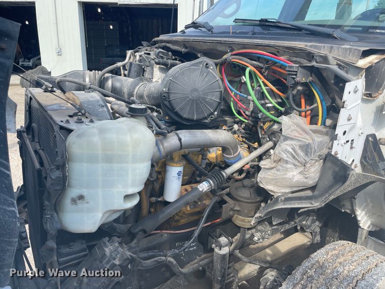 image for item IR9946 2004 Ford F750  digger derrick truck