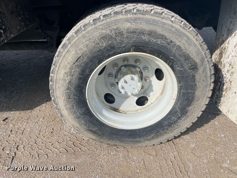 image for item IR9946 2004 Ford F750  digger derrick truck