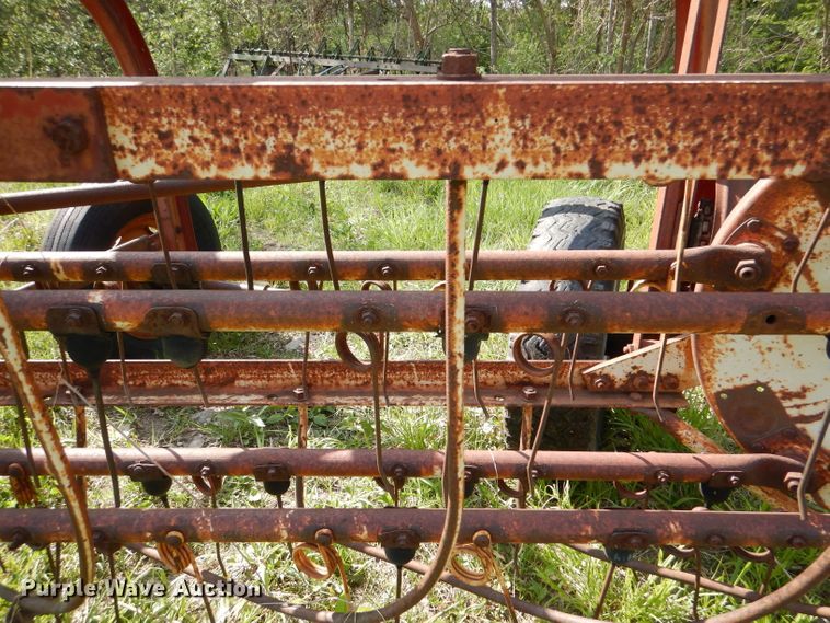 image for item DL8032 John Deere CCA  chisel and International hay rake