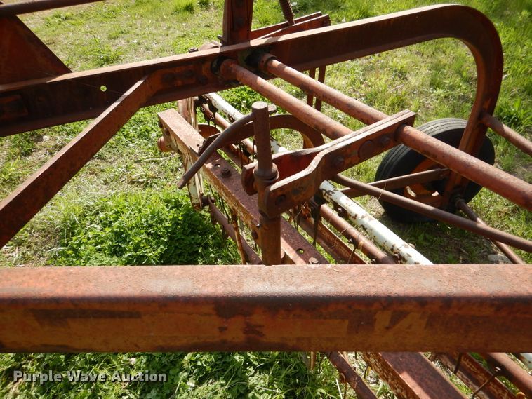 image for item DL8032 John Deere CCA  chisel and International hay rake