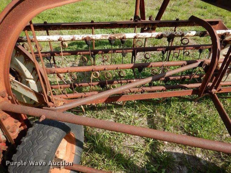 image for item DL8032 John Deere CCA  chisel and International hay rake