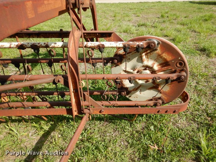 image for item DL8032 John Deere CCA  chisel and International hay rake