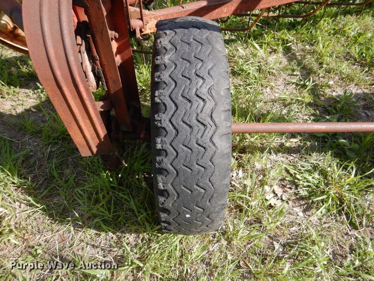 image for item DL8032 John Deere CCA  chisel and International hay rake