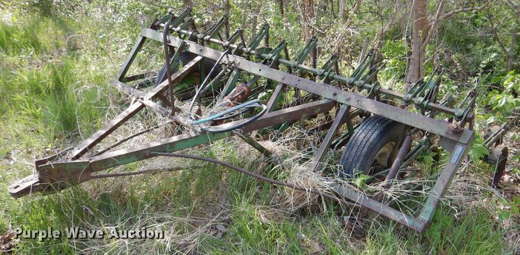 image for item DL8032 John Deere CCA  chisel and International hay rake