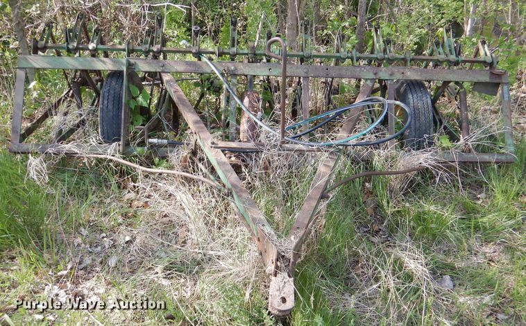 image for item DL8032 John Deere CCA  chisel and International hay rake