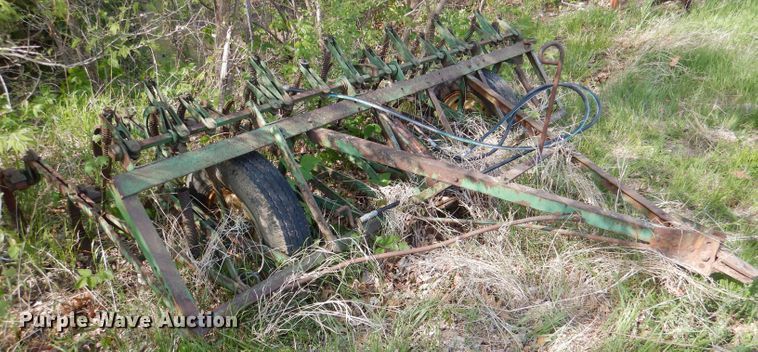 image for item DL8032 John Deere CCA  chisel and International hay rake