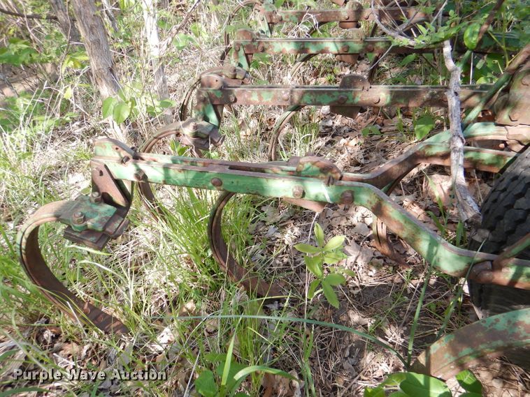 image for item DL8032 John Deere CCA  chisel and International hay rake