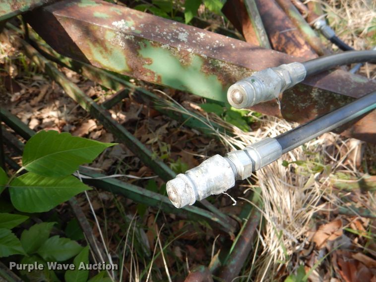 image for item DL8032 John Deere CCA  chisel and International hay rake