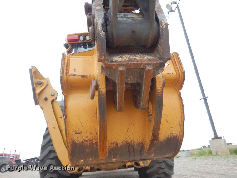 image for item DM3753 2014 John Deere 310SK  backhoe