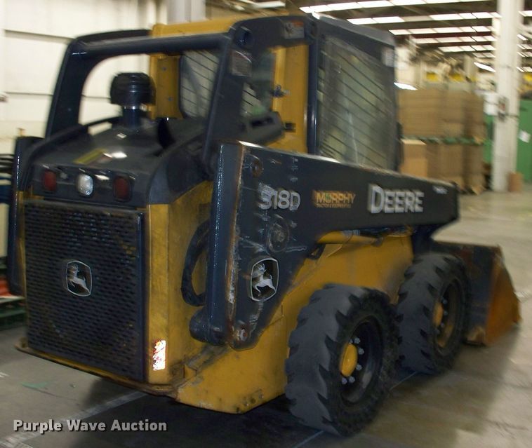 image for item FW9042 2013 John Deere 318D  skid steer loader