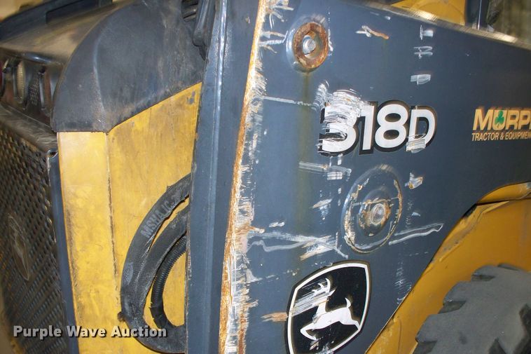 image for item FW9042 2013 John Deere 318D  skid steer loader