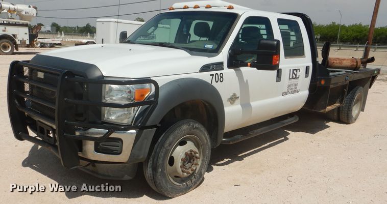 image for item HL9599 2015 Ford F550  flatbed truck