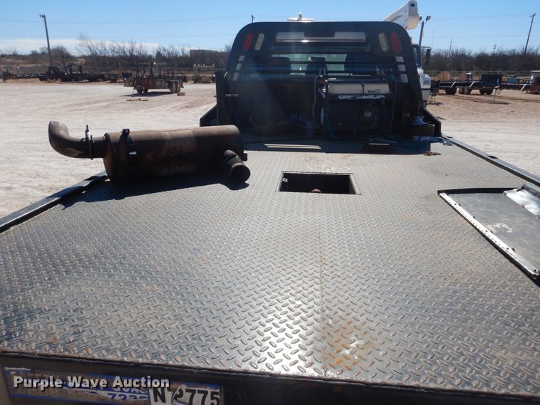 image for item HL9599 2015 Ford F550  flatbed truck