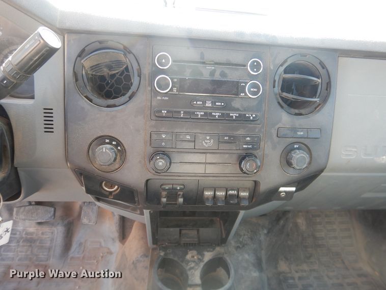 image for item HL9599 2015 Ford F550  flatbed truck