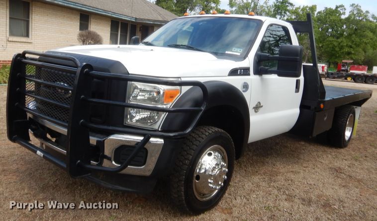 image for item IP9772 2011 Ford F550 Super Duty  flatbed truck