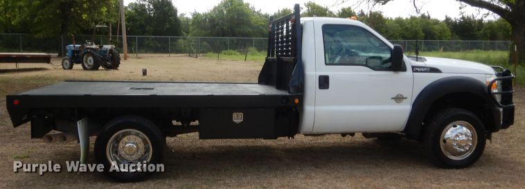 image for item IP9772 2011 Ford F550 Super Duty  flatbed truck