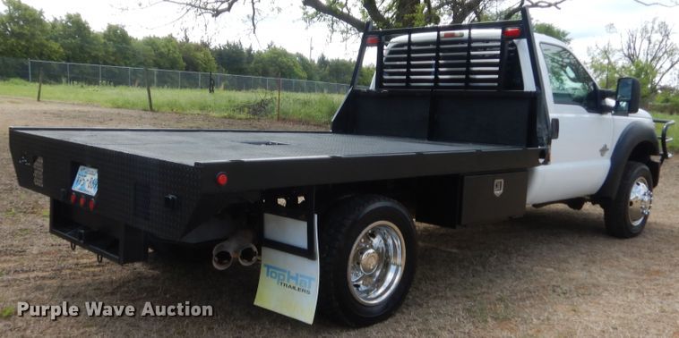 image for item IP9772 2011 Ford F550 Super Duty  flatbed truck
