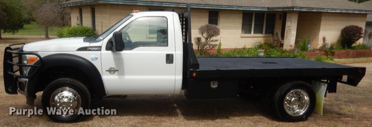 image for item IP9772 2011 Ford F550 Super Duty  flatbed truck