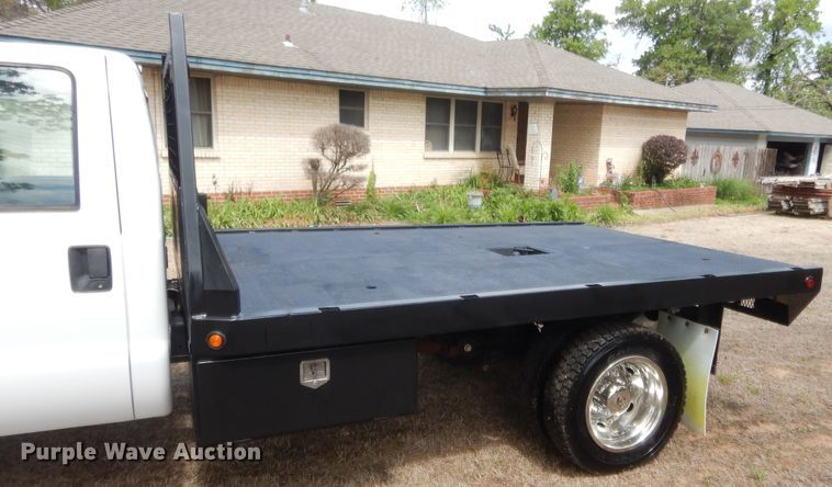 image for item IP9772 2011 Ford F550 Super Duty  flatbed truck