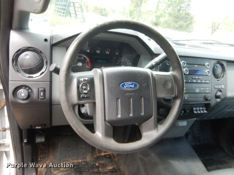 image for item IP9772 2011 Ford F550 Super Duty  flatbed truck