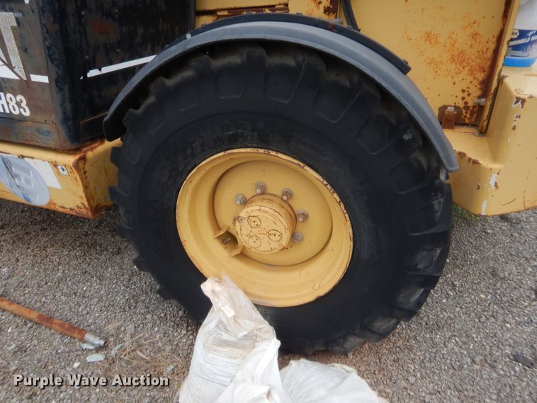 image for item IP9784 2001 Caterpillar TH83  telehandler