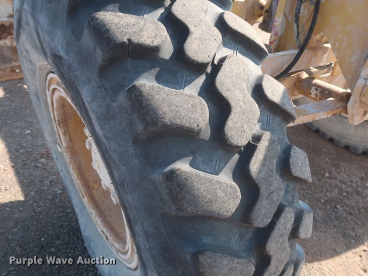 image for item DJ1834 1998 Caterpillar 140H  motor grader