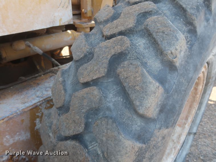 image for item DJ1834 1998 Caterpillar 140H  motor grader