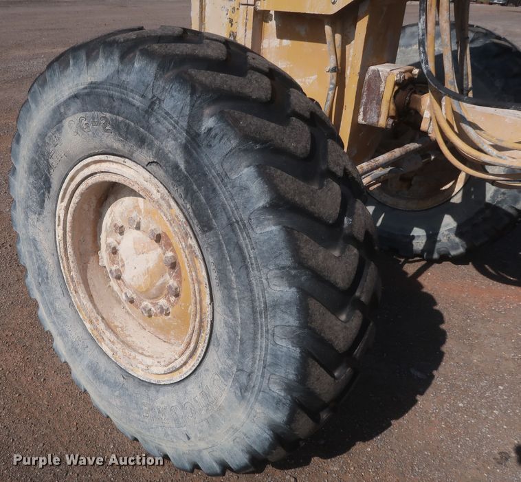 image for item DJ1834 1998 Caterpillar 140H  motor grader