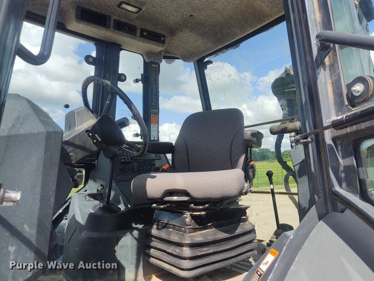 image for item IK9318 2018 John Deere 410L  backhoe