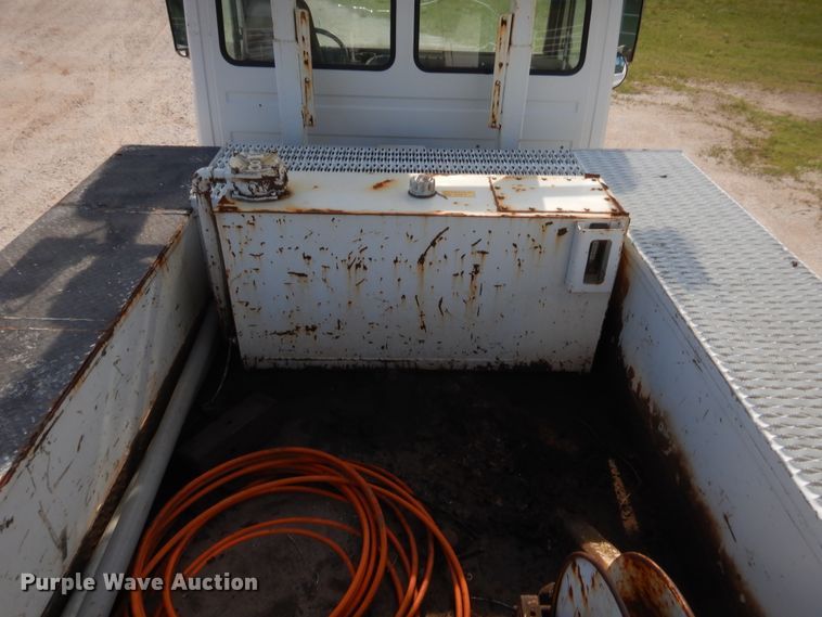 image for item IP9777 2002 Freightliner FL80  pressure digger derrick truck