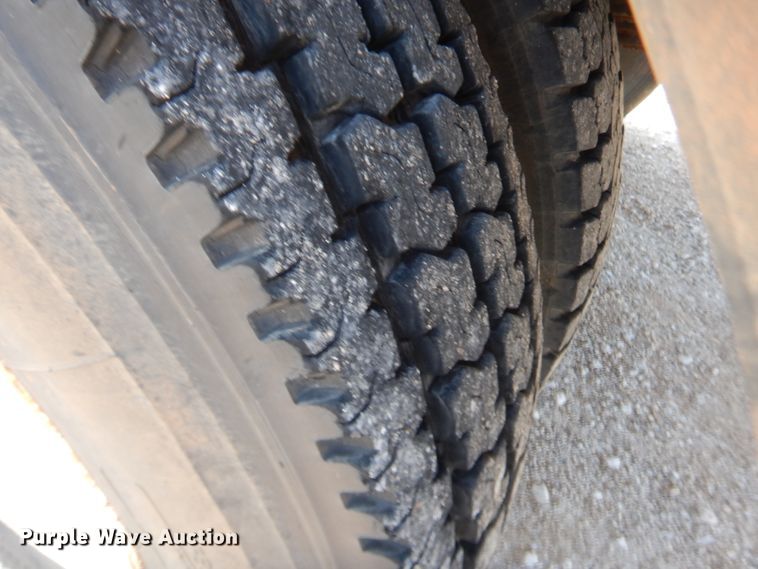 image for item IP9777 2002 Freightliner FL80  pressure digger derrick truck